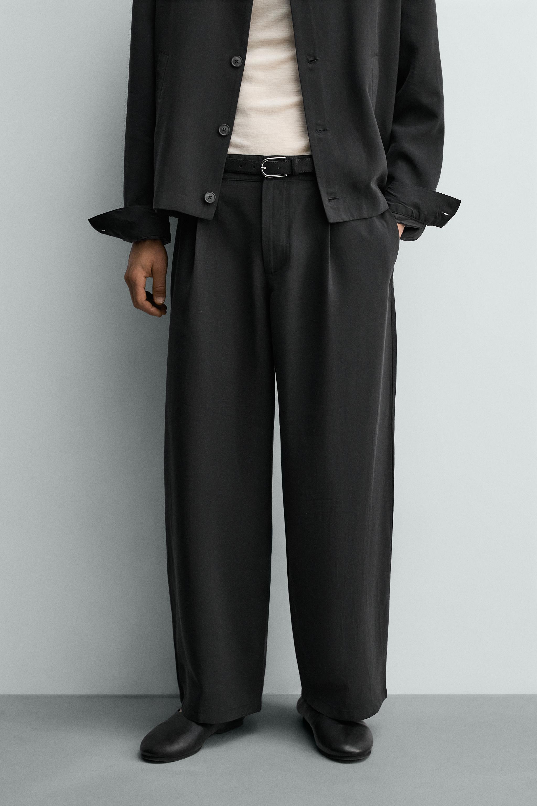 FLOWY PLEATED PANTS