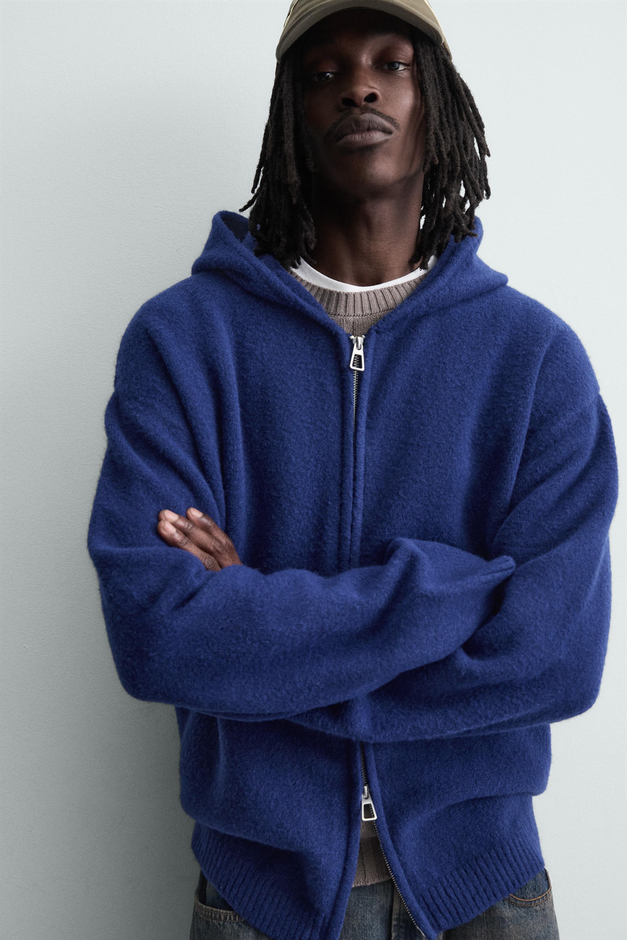 GILET EN MAILLE À CAPUCHE