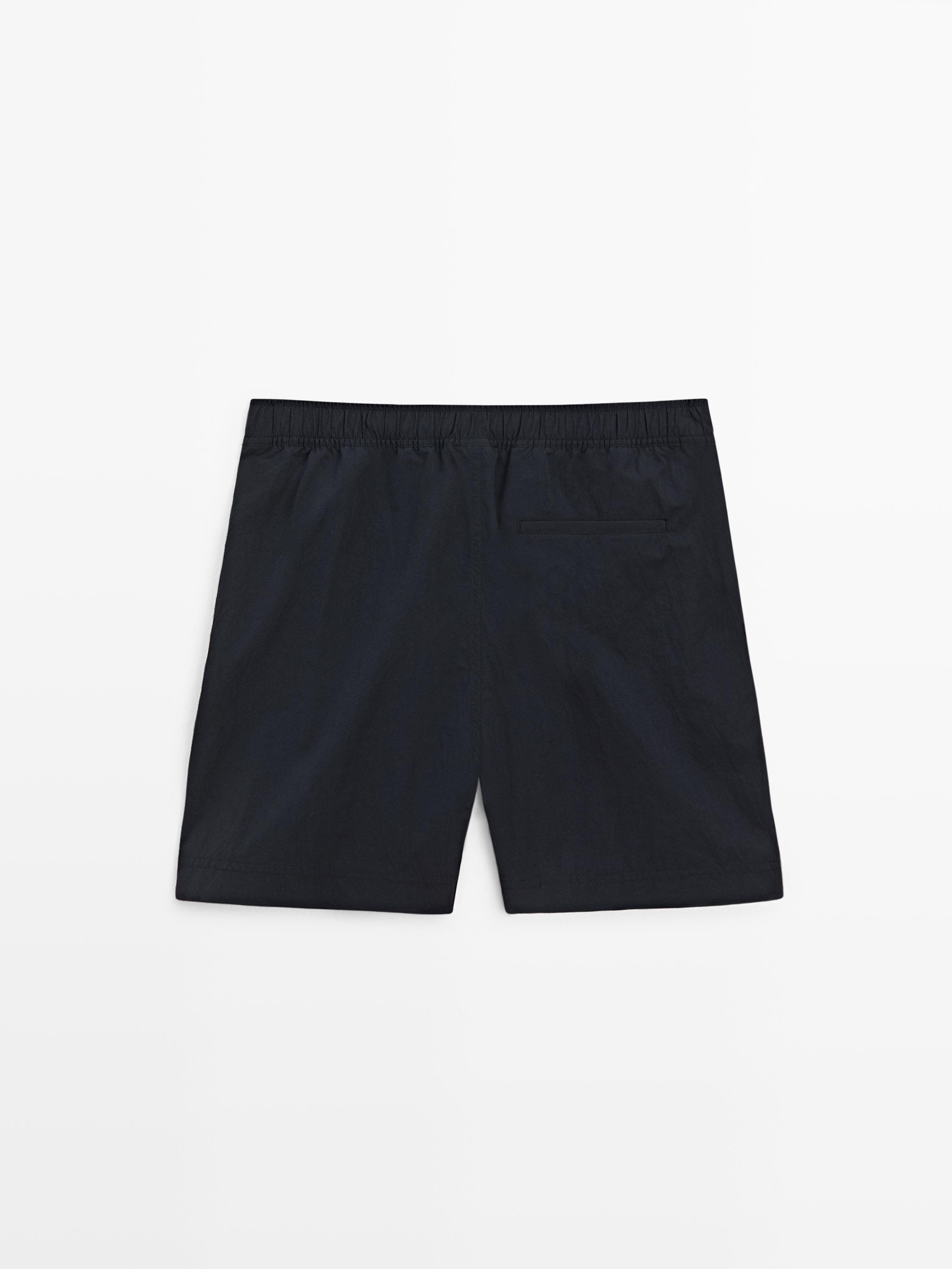 Maillot de bain uni détail taille