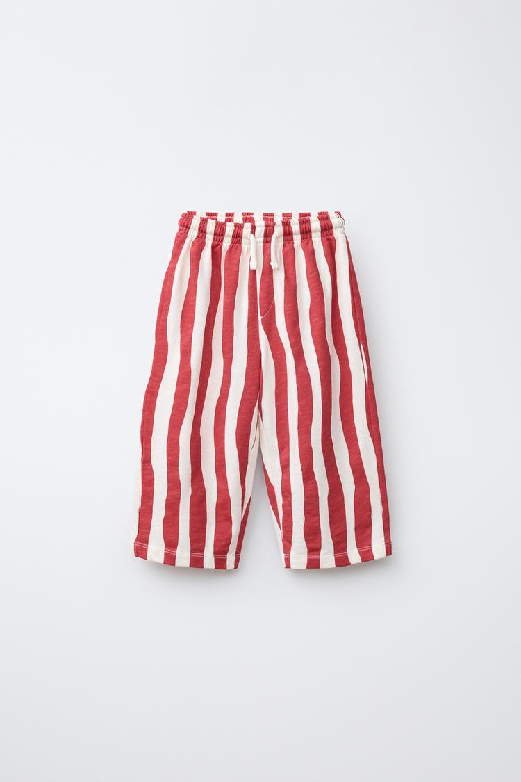 WAVE STRIPED PANTS — Red