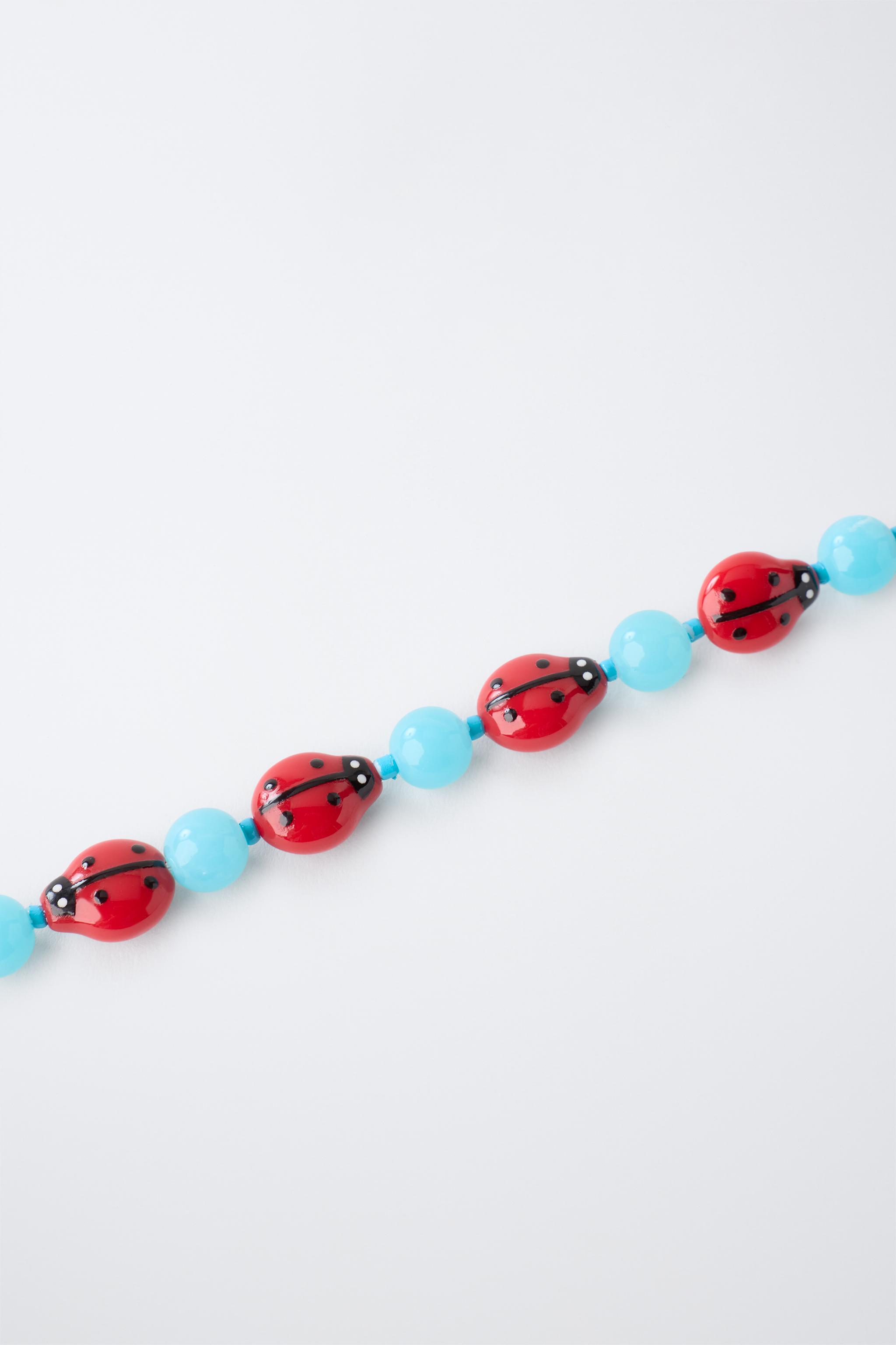 LADYBUG BEADED NECKLACE — Red
