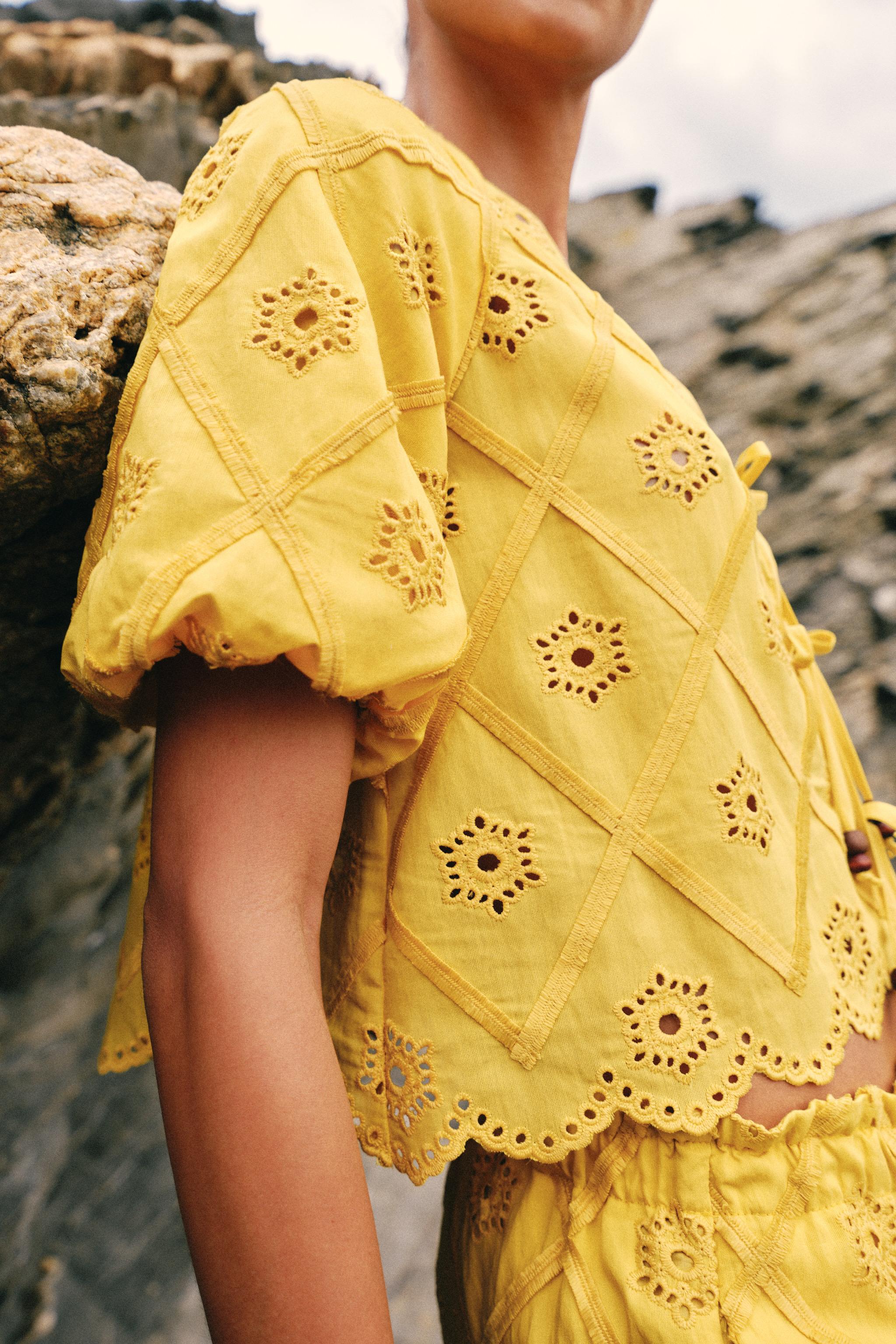 EMBROIDERED EYELET TOP