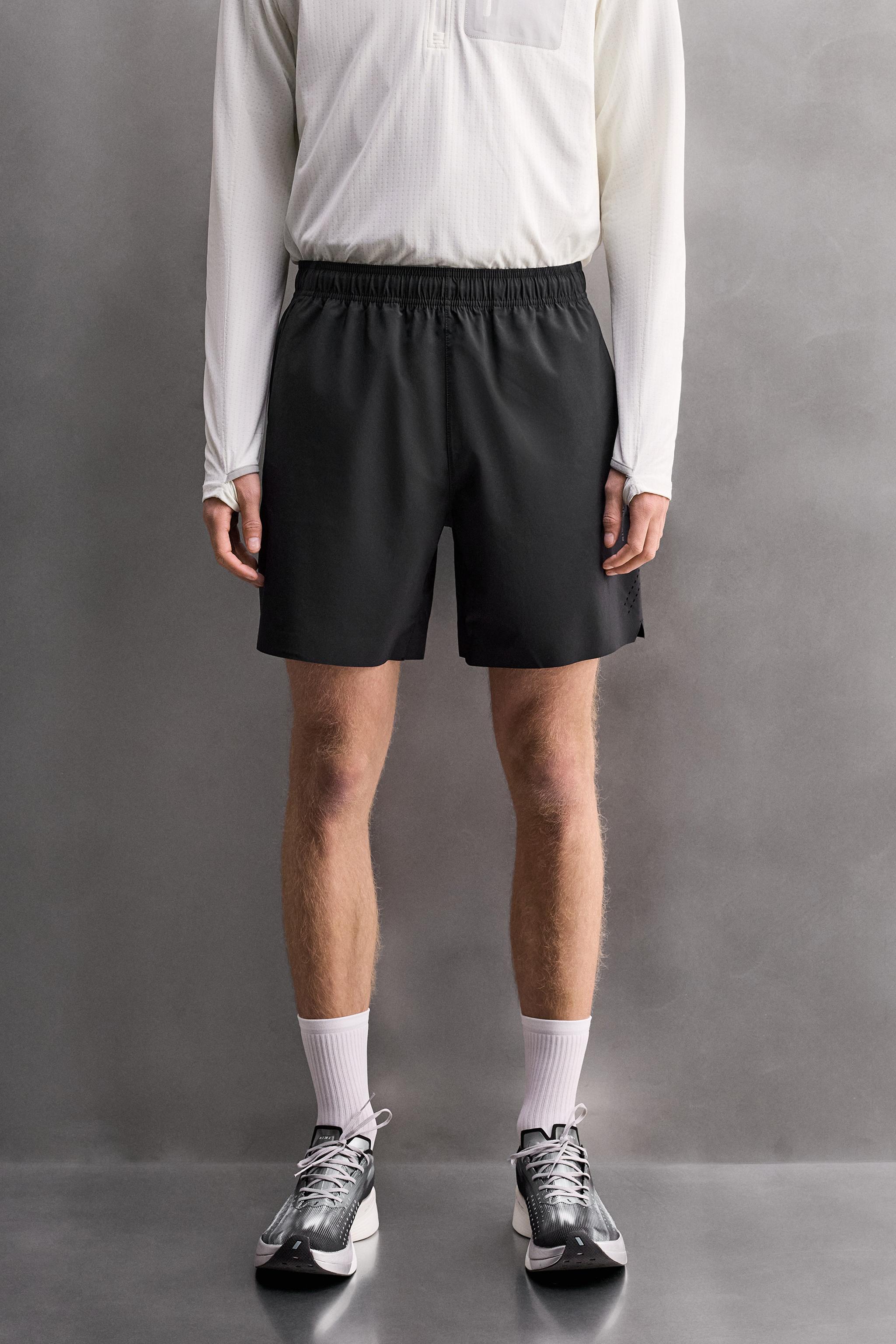 9" PERFORATED SHORTS