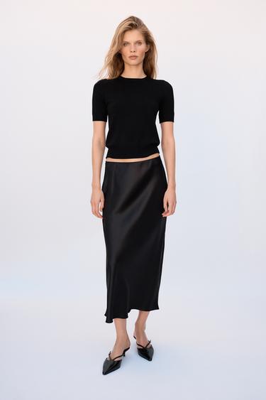TOP BASIQUE EN MAILLE UNI À MANCHES COURTES - Noir de Zara