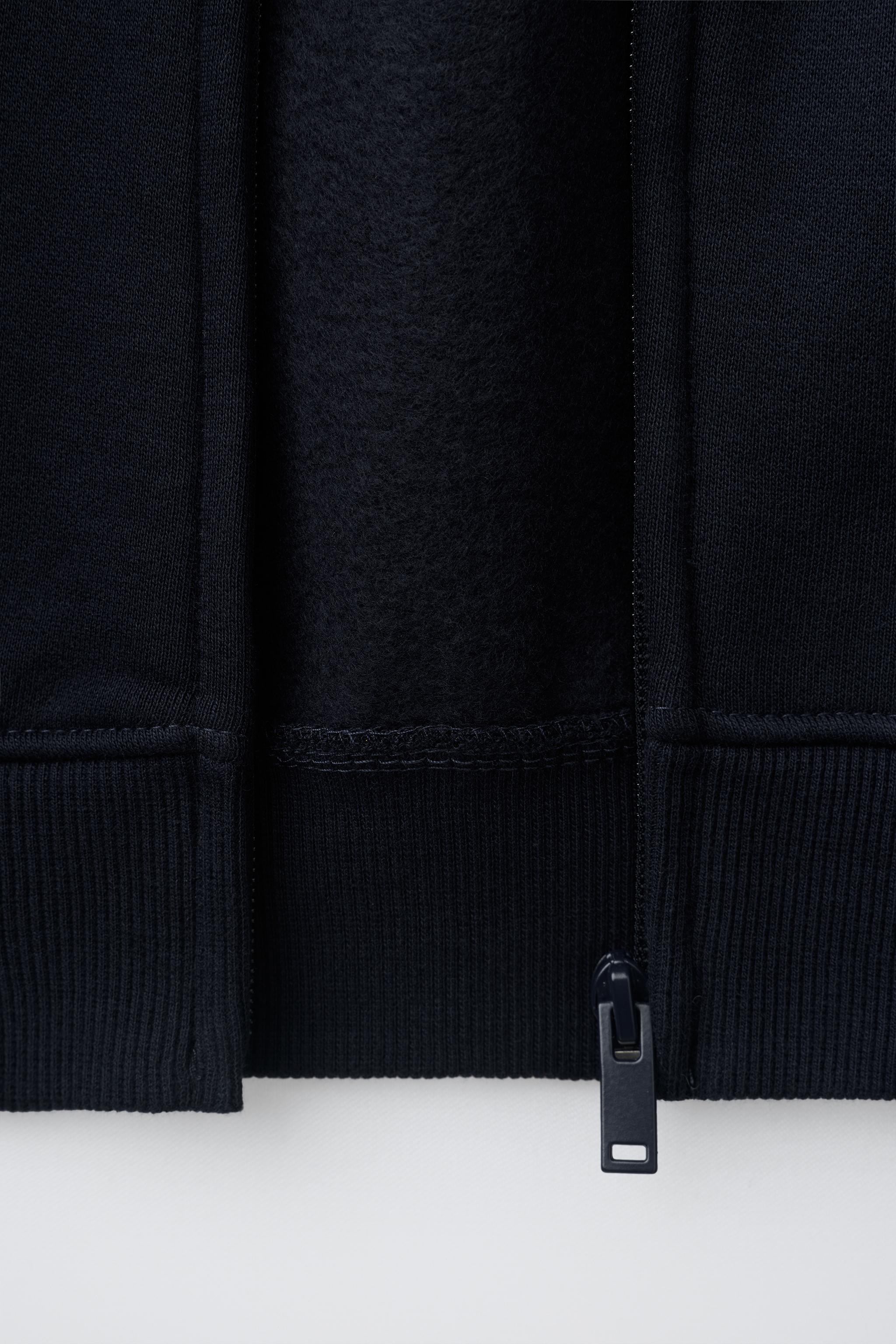 SWEAT ZIPPÉ À CAPUCHE