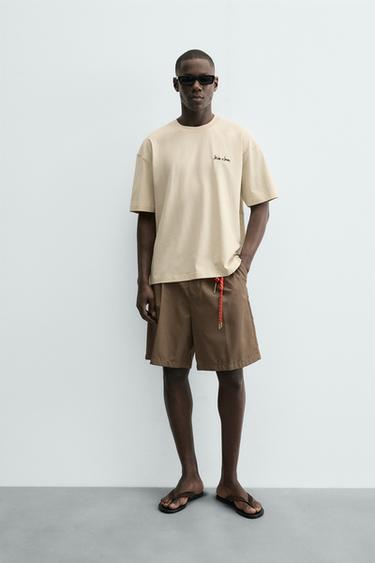 CAMISETA ESTAMPA EM CONTRASTE - Areia da Zara - Imagem 0