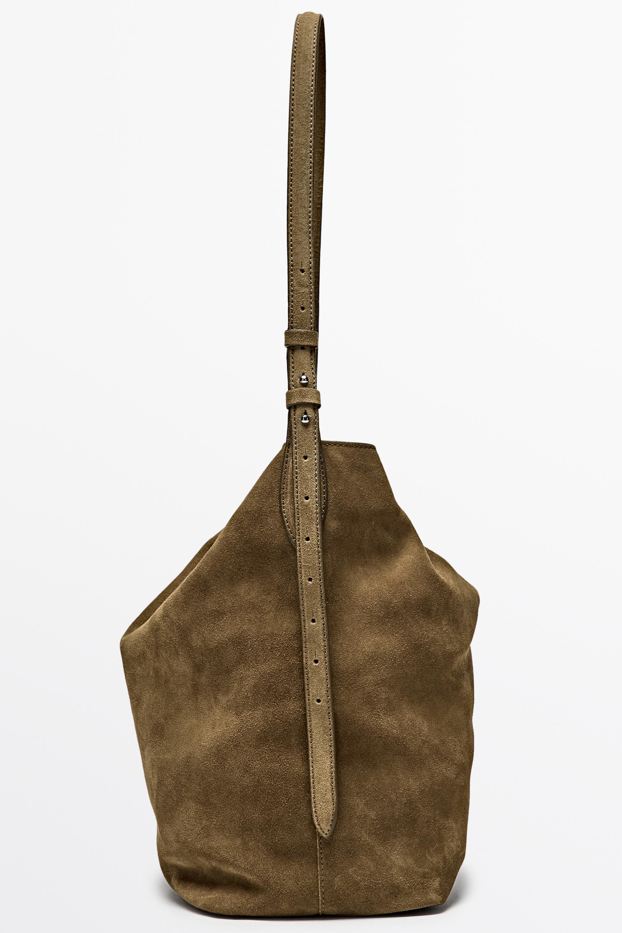 Distressed split suede leather bucket bag — 566