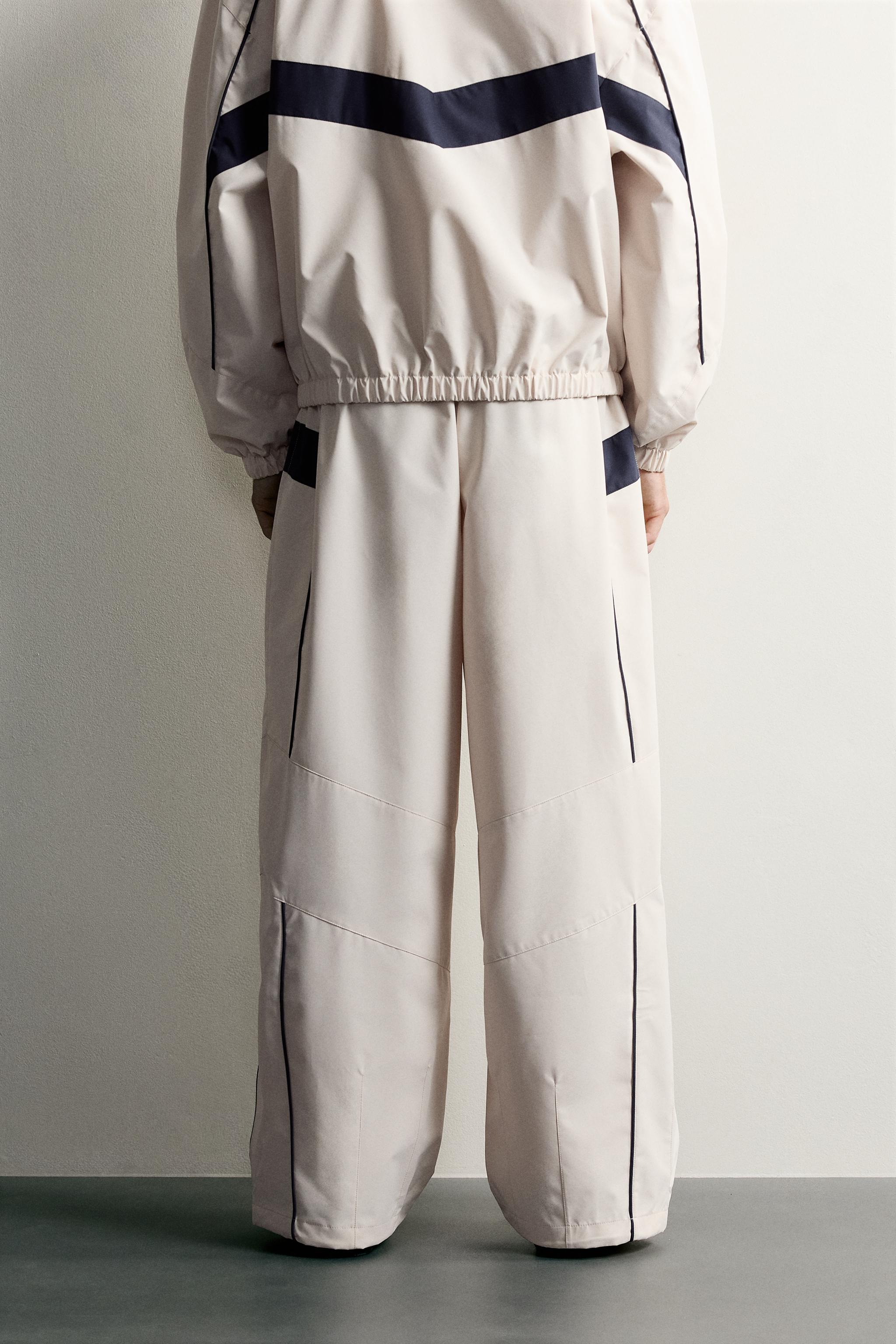 PANTALON TECHNIQUE À CONTRASTES DÉPERLANT