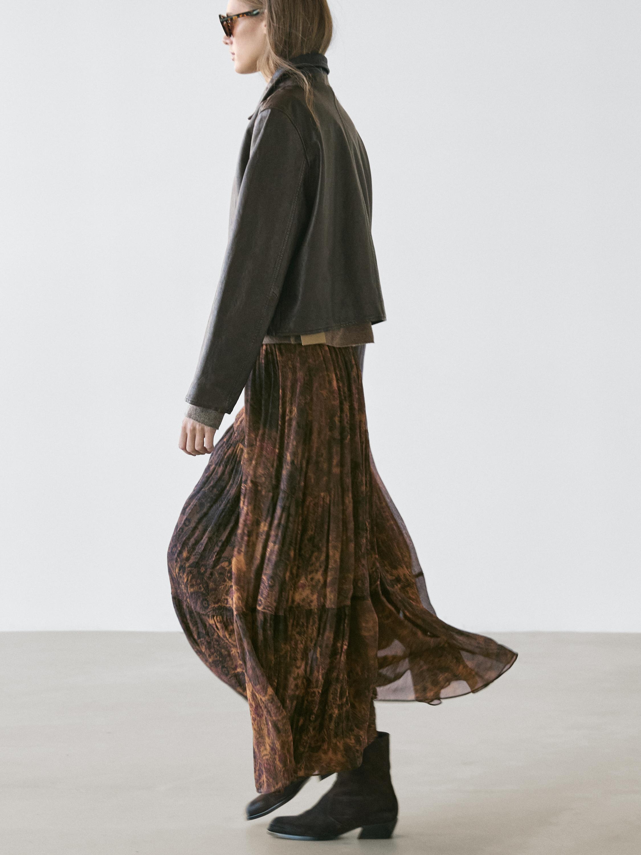 Flowing asymmetric midi skirt