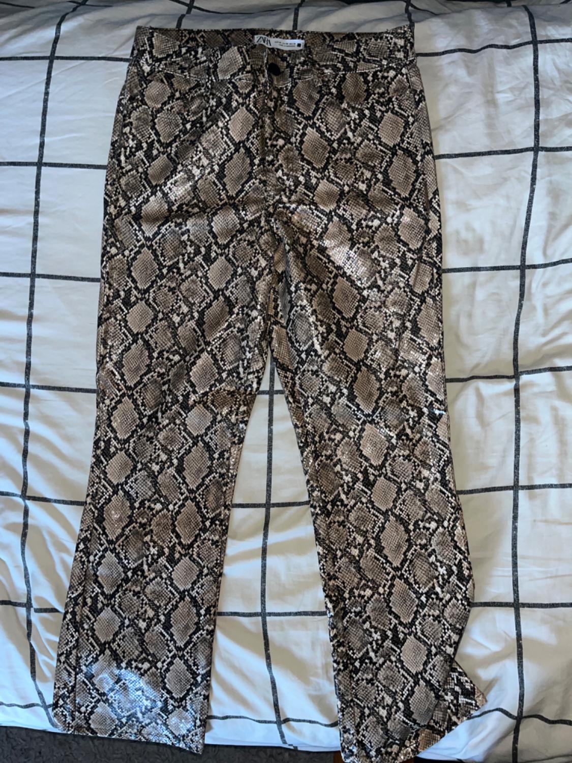 ANIMAL PRINT FAUX LEATHER PANTS