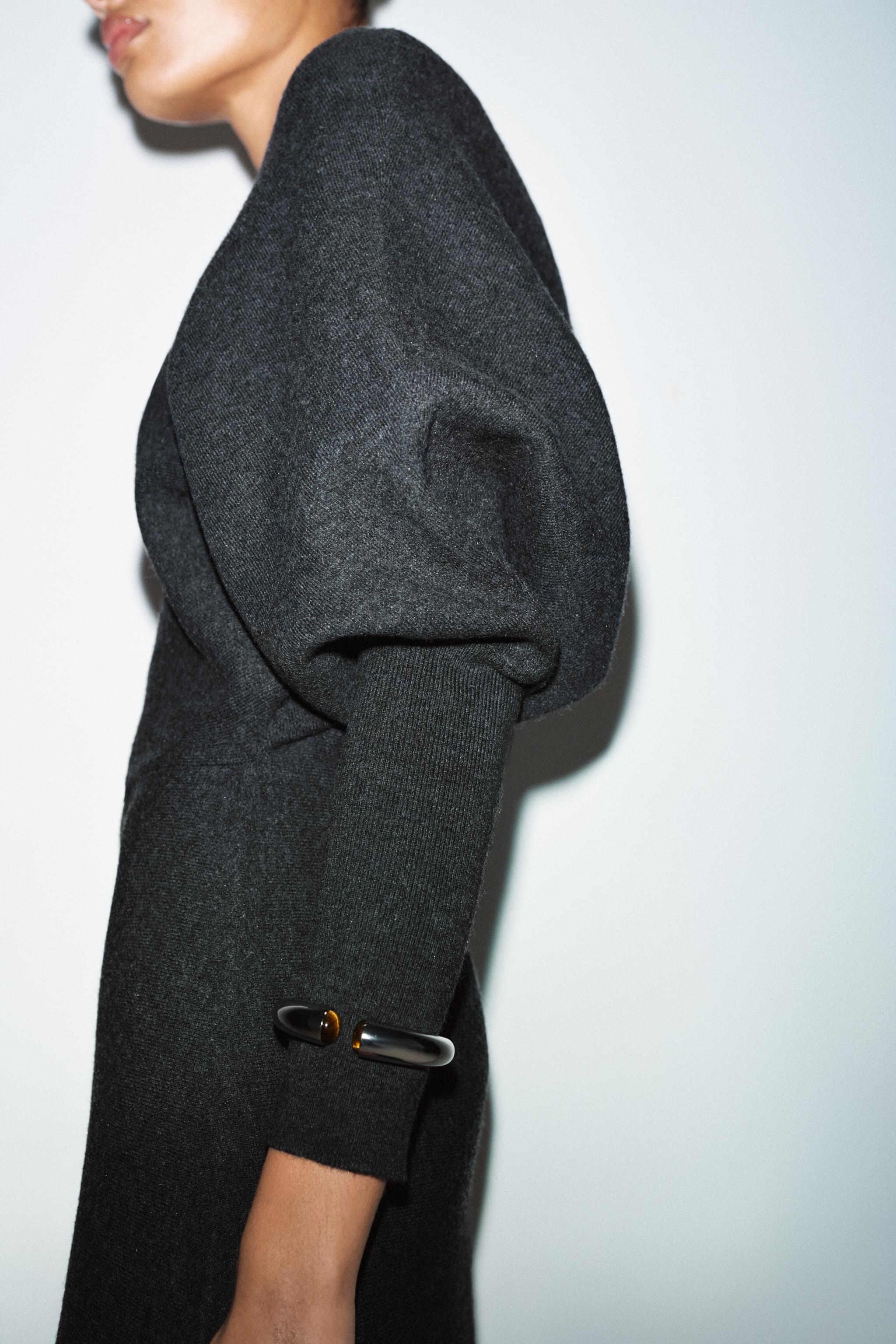 ROBE MI-LONGUE EN MAILLE COL V