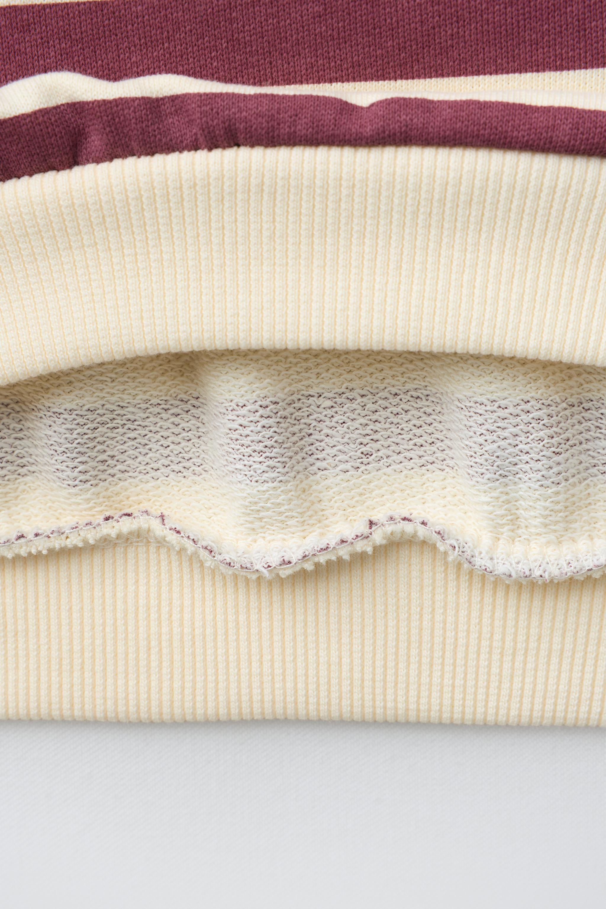 STRIPED PRINT SWEATSHIRT
