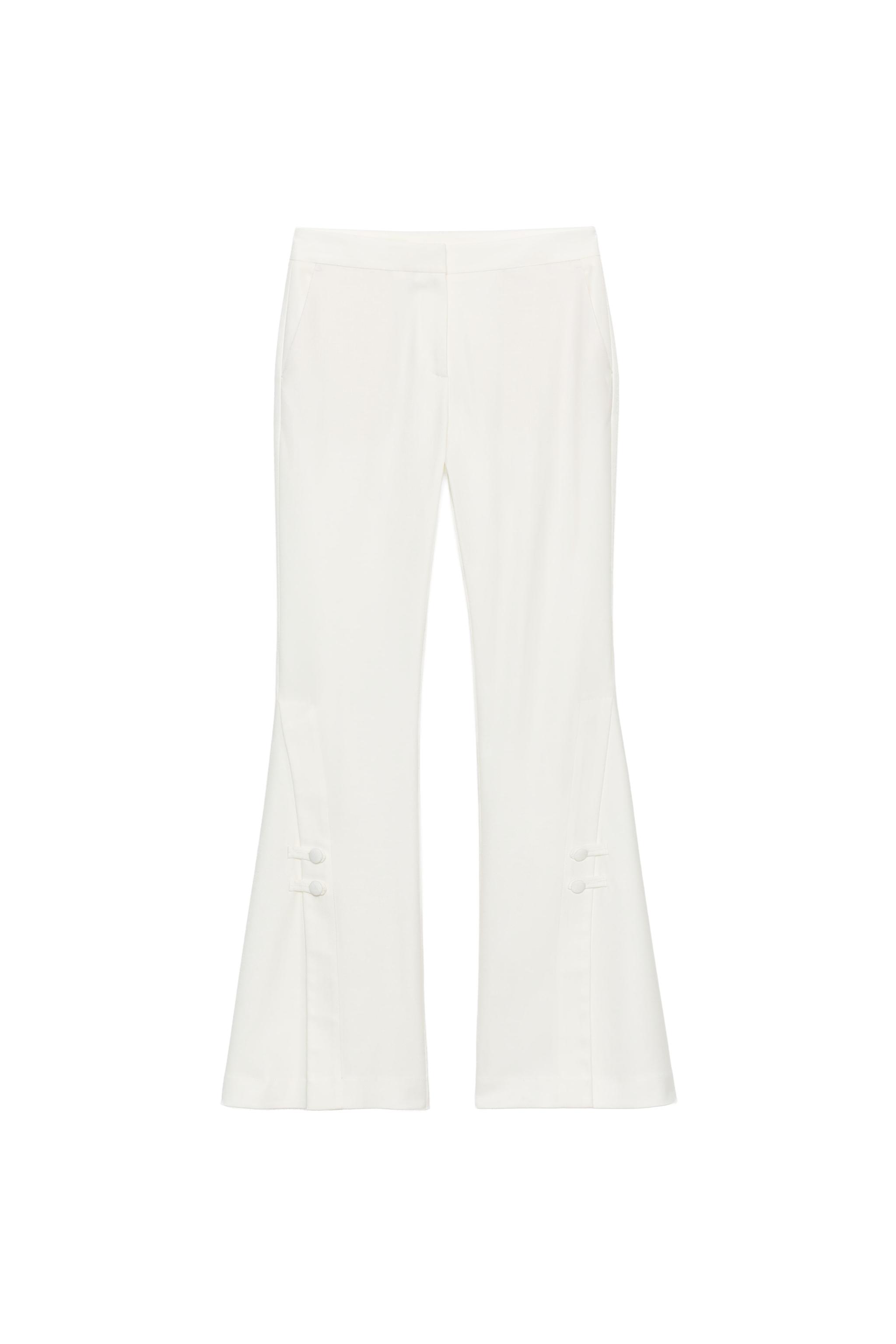 PANTS WITH SLIT HEMS