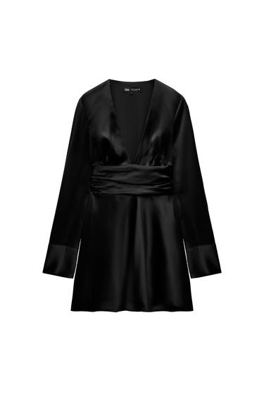 Front view of black dress with V-neck and long sleeves