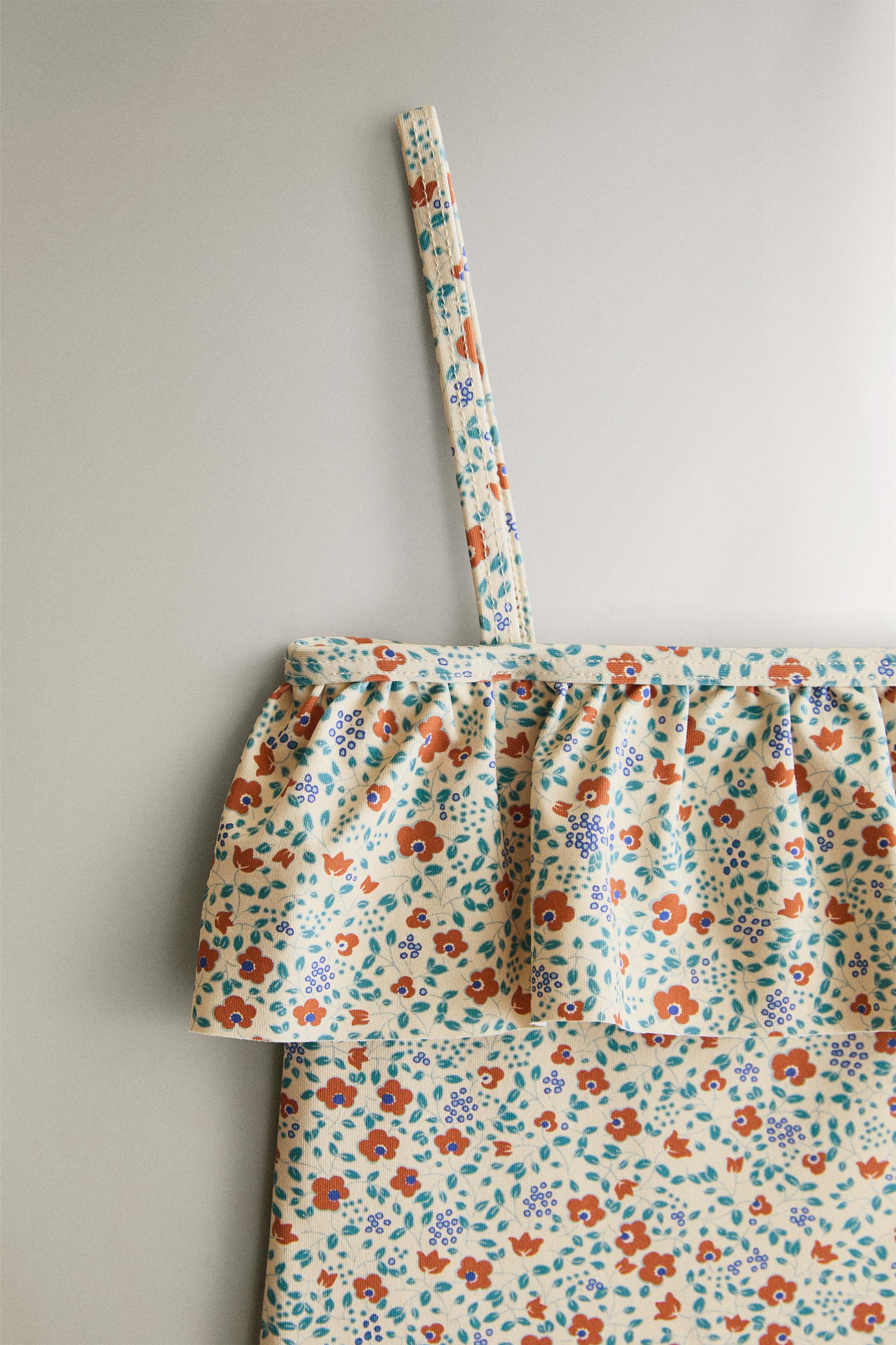 KIDS’ FLORAL RUFFLE BEACH SWIMSUIT