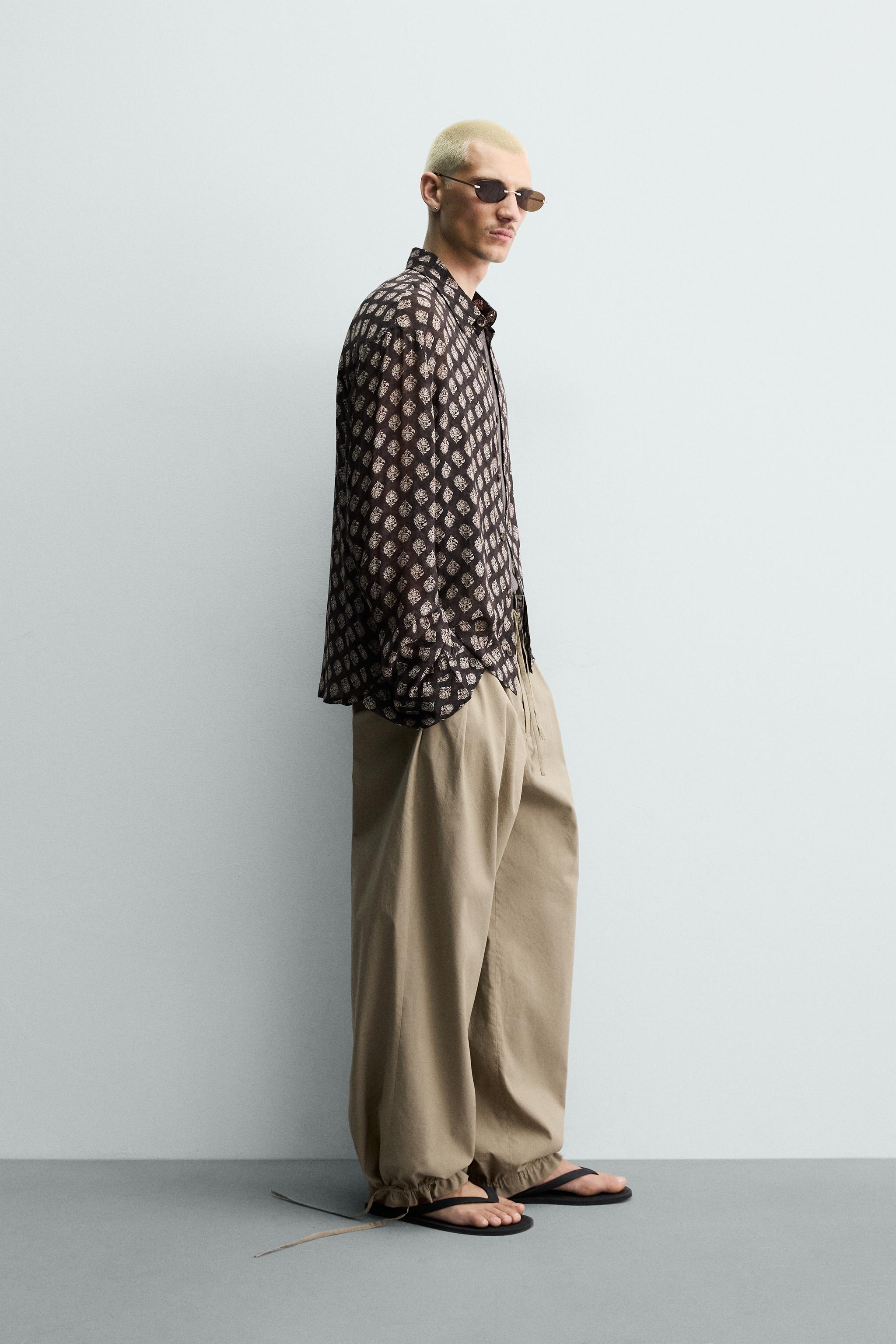 BALLOON FIT PLEATED PANTS