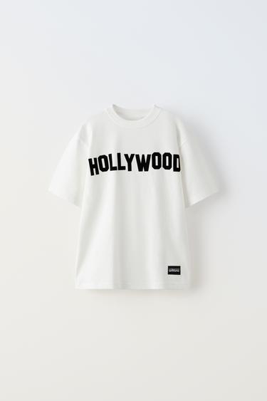 ФУТБОЛКА С РЕЛЬЕФНЫМ ПРИНТОМ «ГОЛЛИВУД»® — ЖЕЛТОВАТО-БЕЛЫЙ от Zara — изображение 0