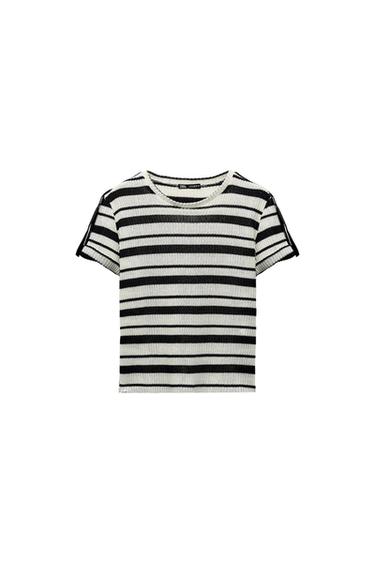 White and black horizontal striped t-shirt, short-sleeved, on a white background. Visible tag on the collar.