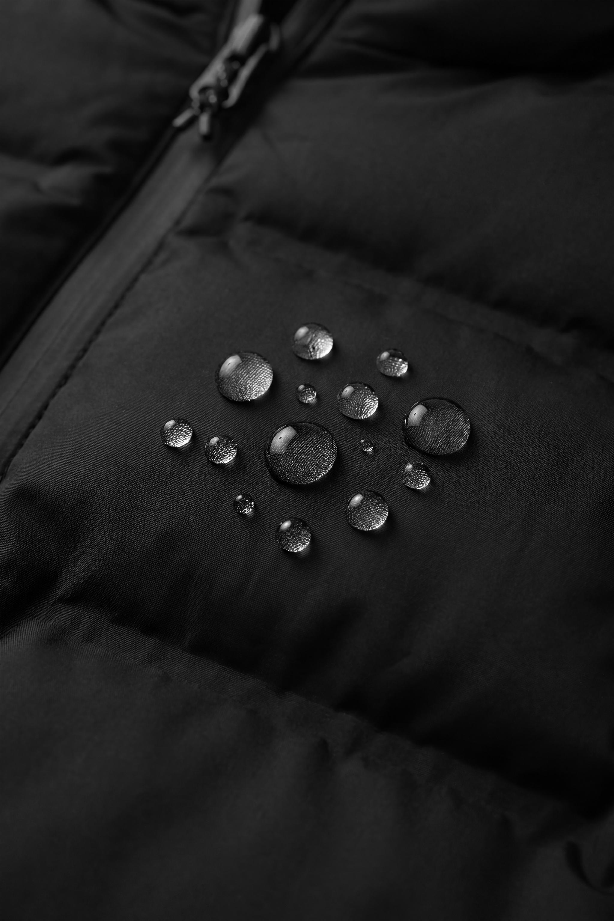 BLOUSON MATELASSÉ À CAPUCHE DÉPERLANT
