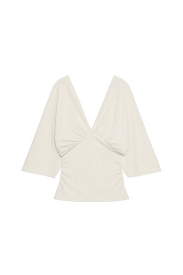 Zaras TOPP MED TEXTUR OCH V-RINGNING - Naturfärg