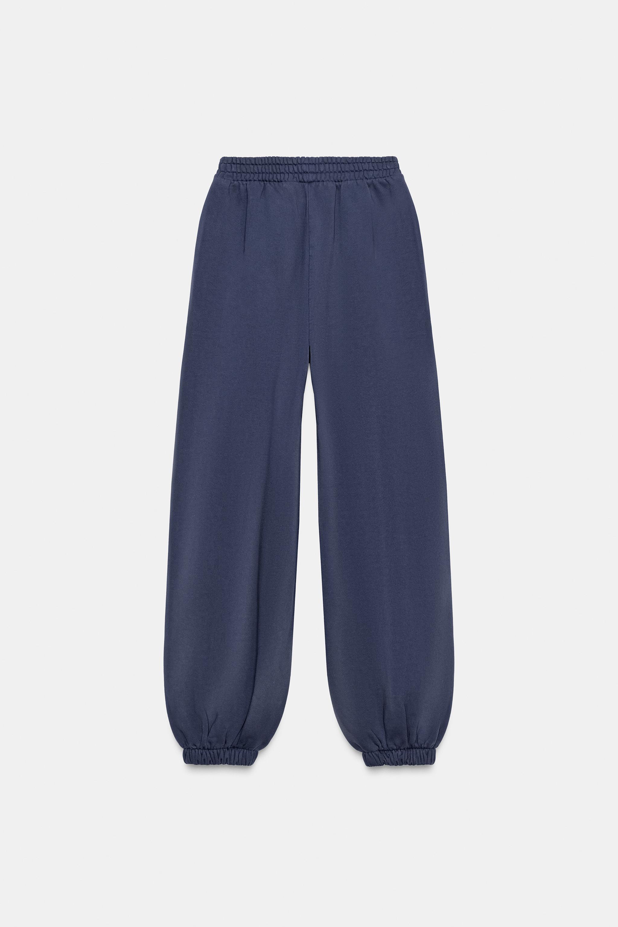 PANTALON DE JOGGING DÉLAVÉ AVEC CLOUS