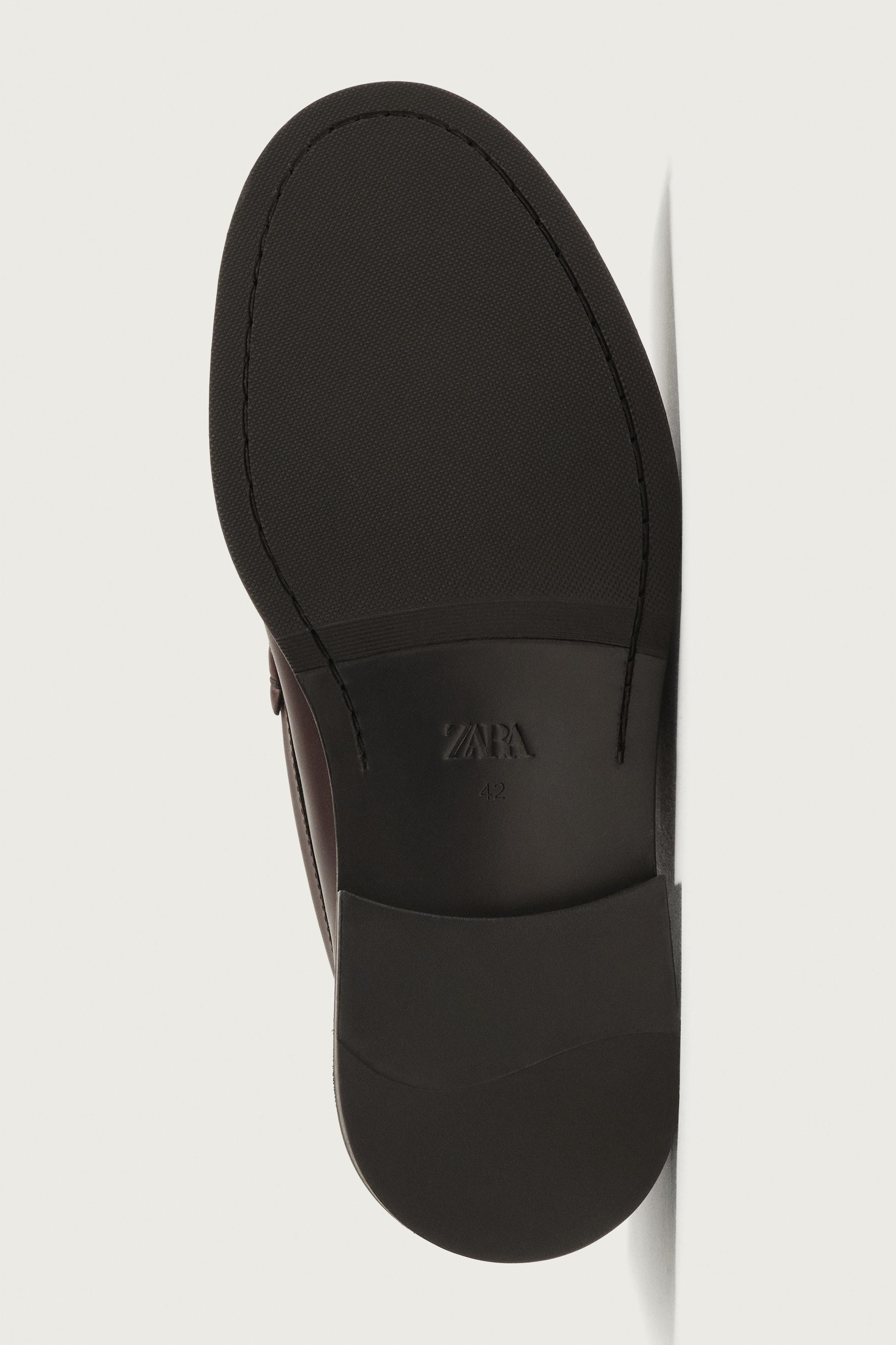 MOCASSINS EN CUIR À MASQUE