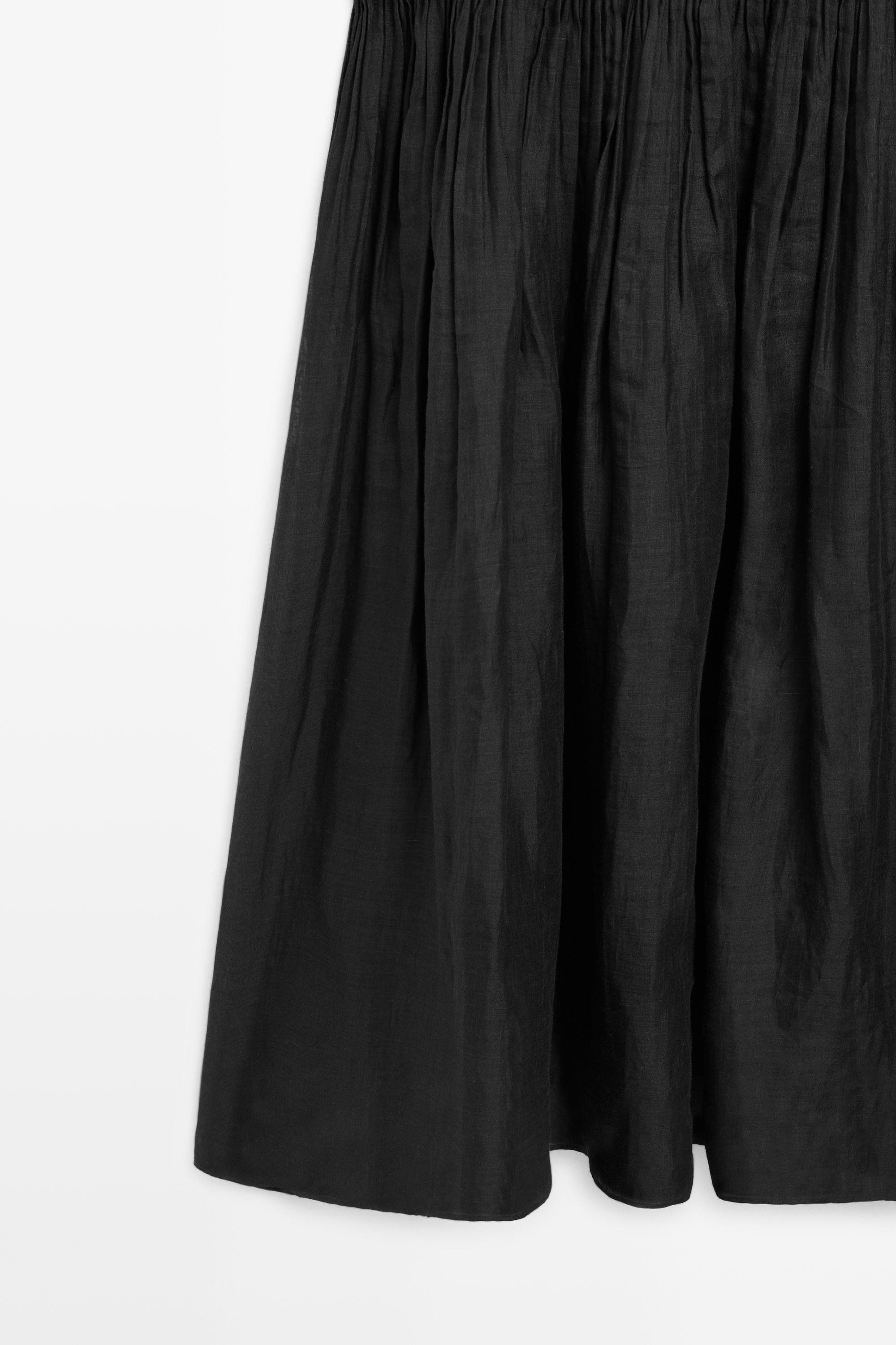 Flowing embroidered midi dress with pintuck detail — Black