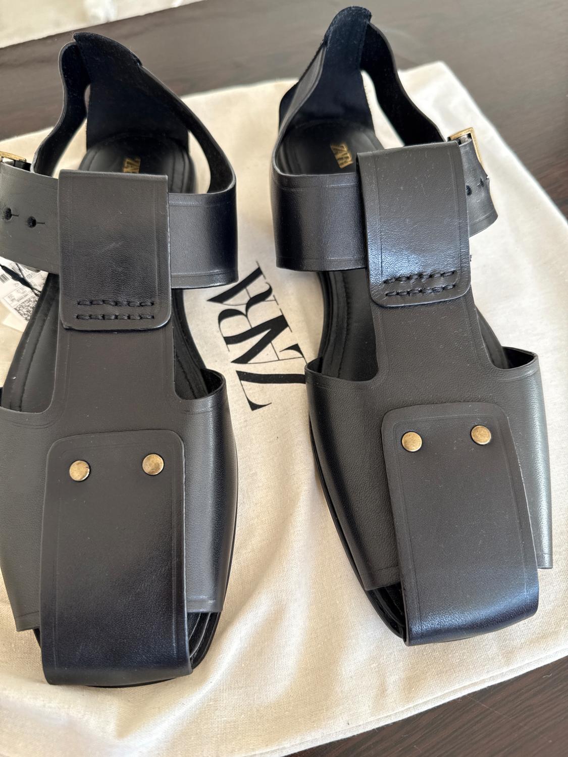 LEATHER CAGE SANDALS WITH STUDS