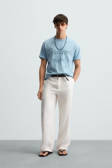 CAMISETA TEXTO RELIEVE - Azul de Zara - Imagen 0