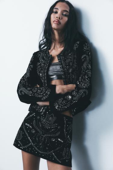 FALDA MINI TERCIOPELO LENTEJUELAS - Negro de Zara