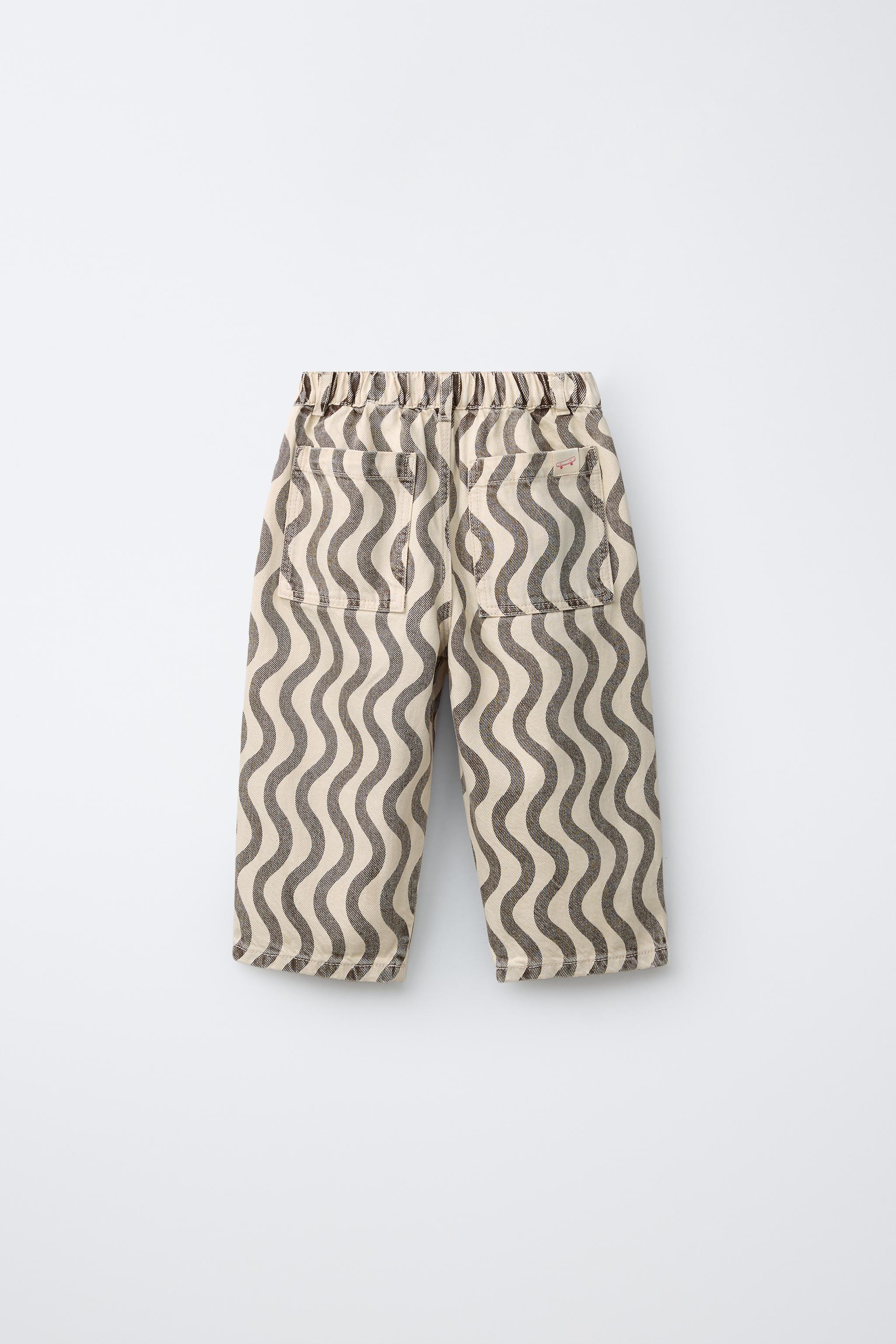 GEOMETRIC PRINT JEANS