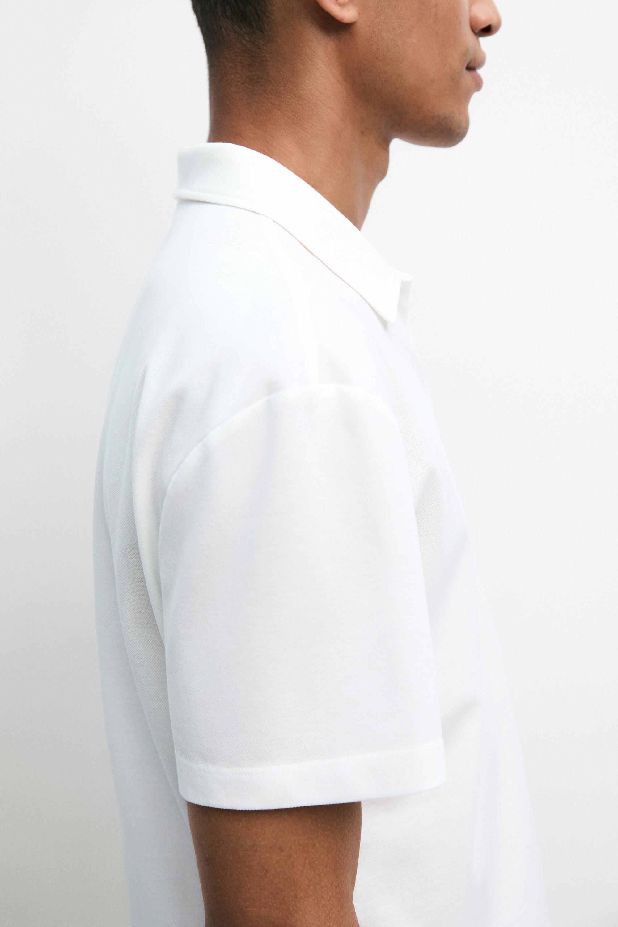 Polo piqué micro-texturé à col en V