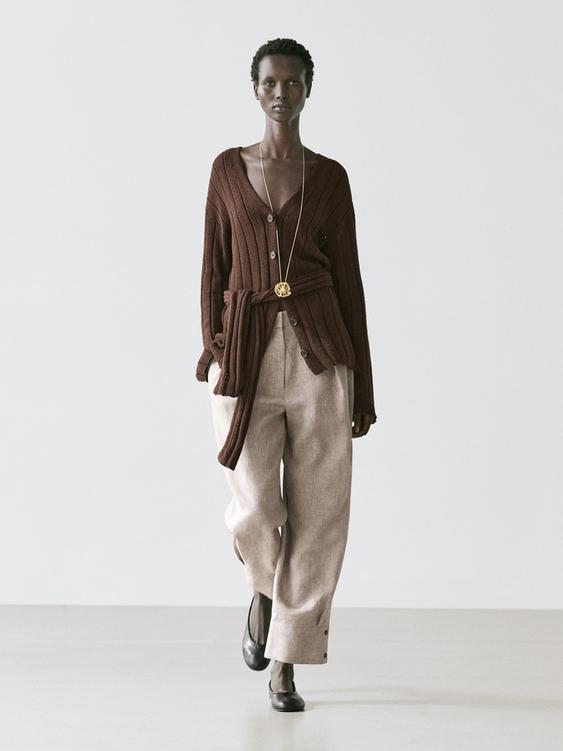 Suit trousers with buckle detail