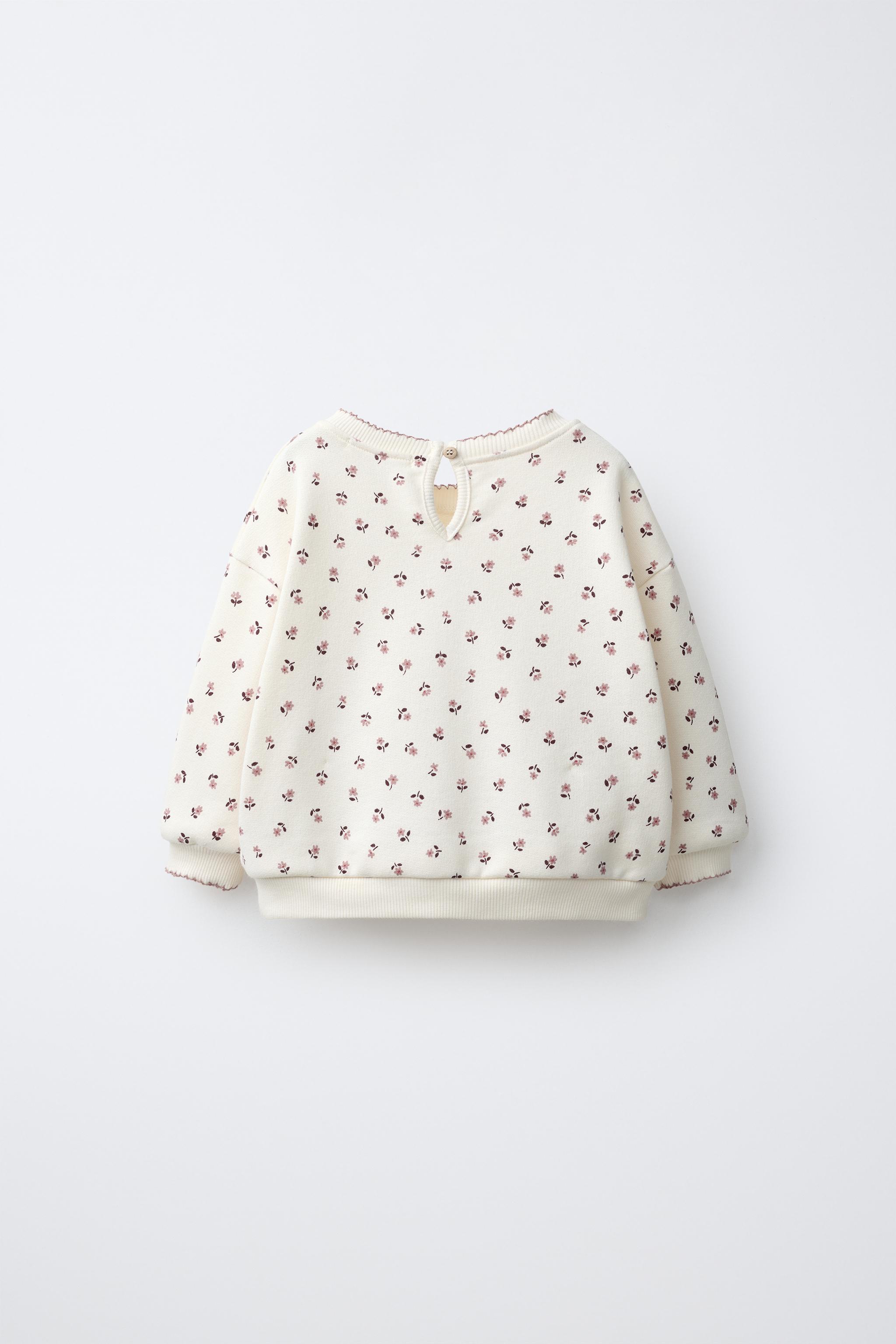 FLORAL PRINT SWEATSHIRT