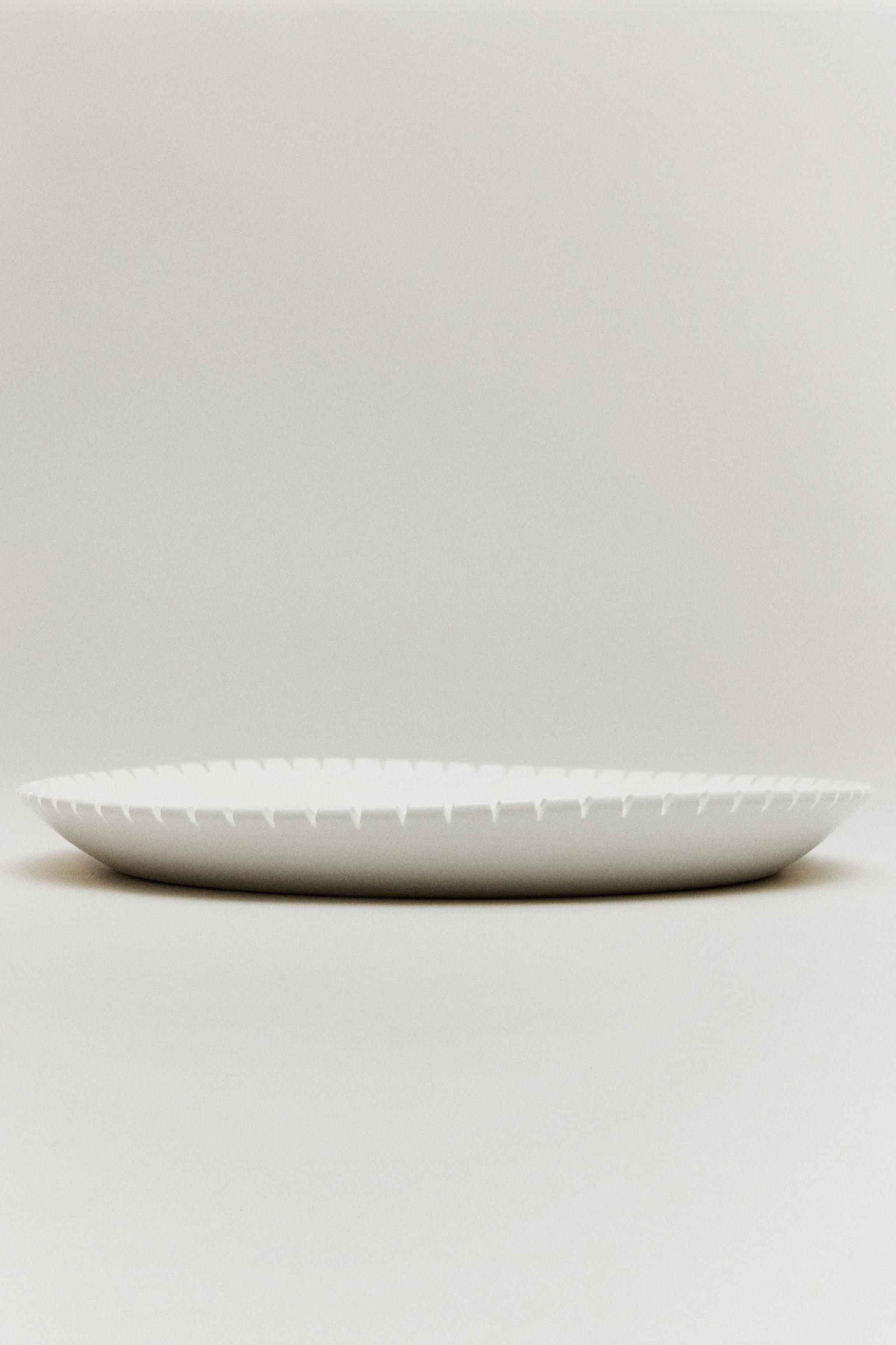 THE DENTATA FLAT PLATE