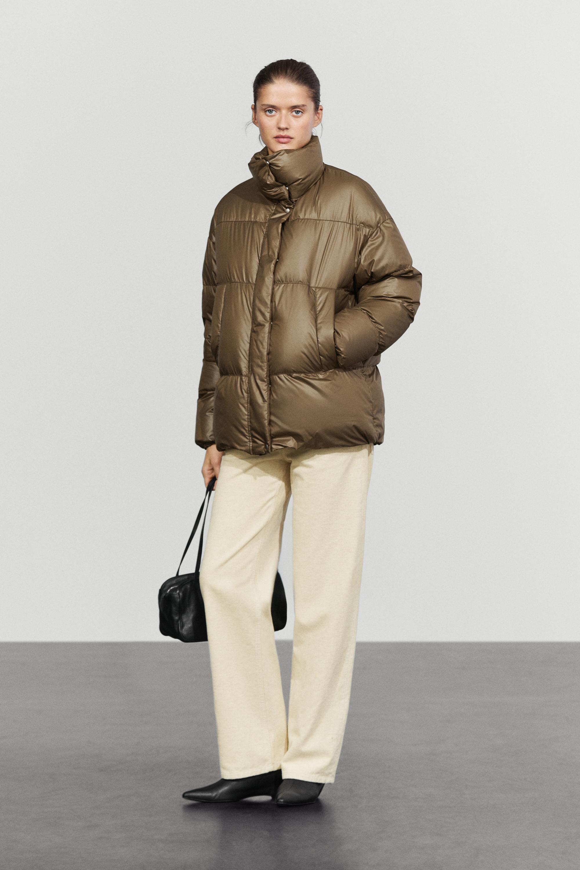 Down jacket with plaid interior detail