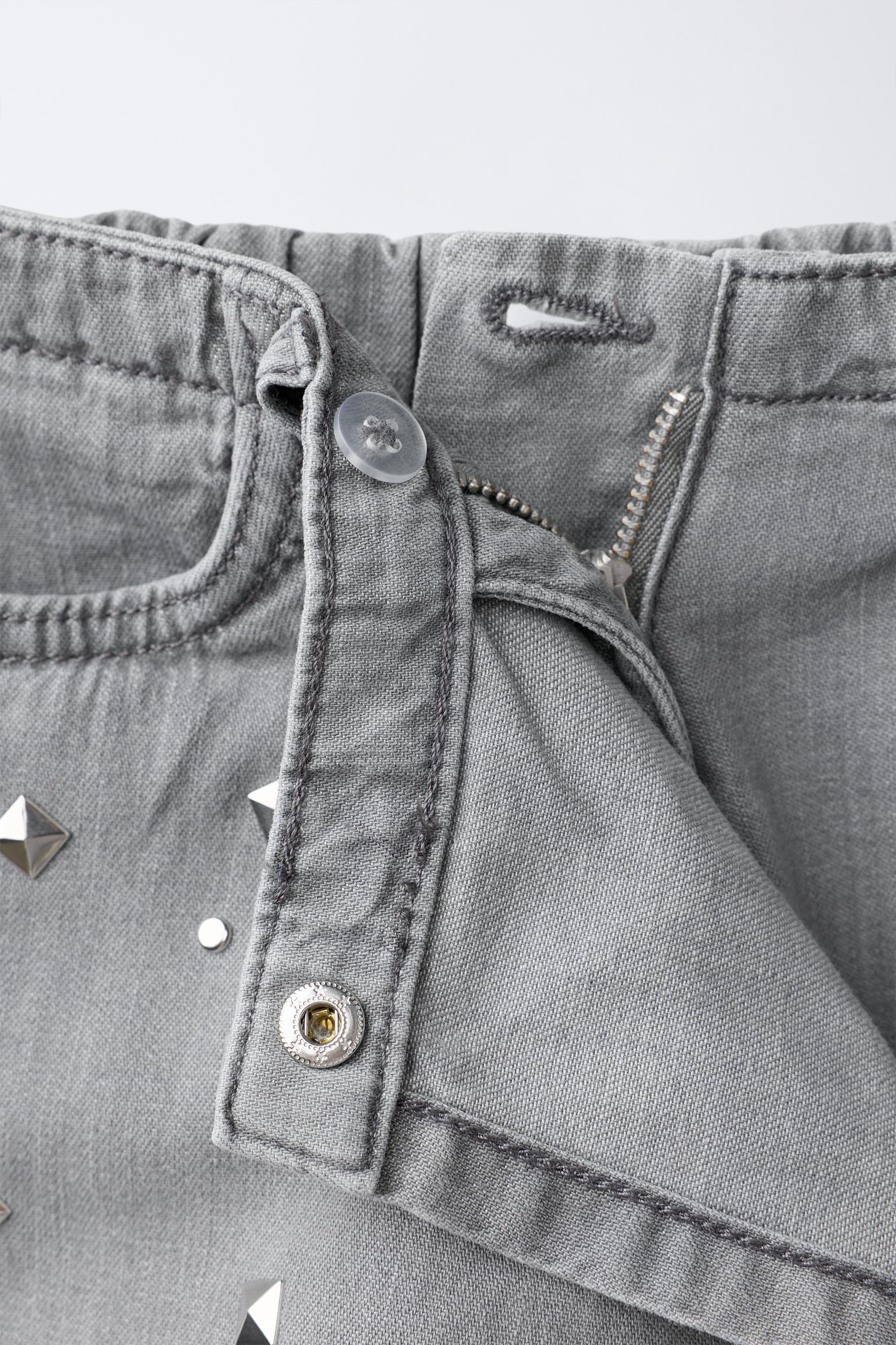JUPE-SHORT EN JEAN À CLOUS