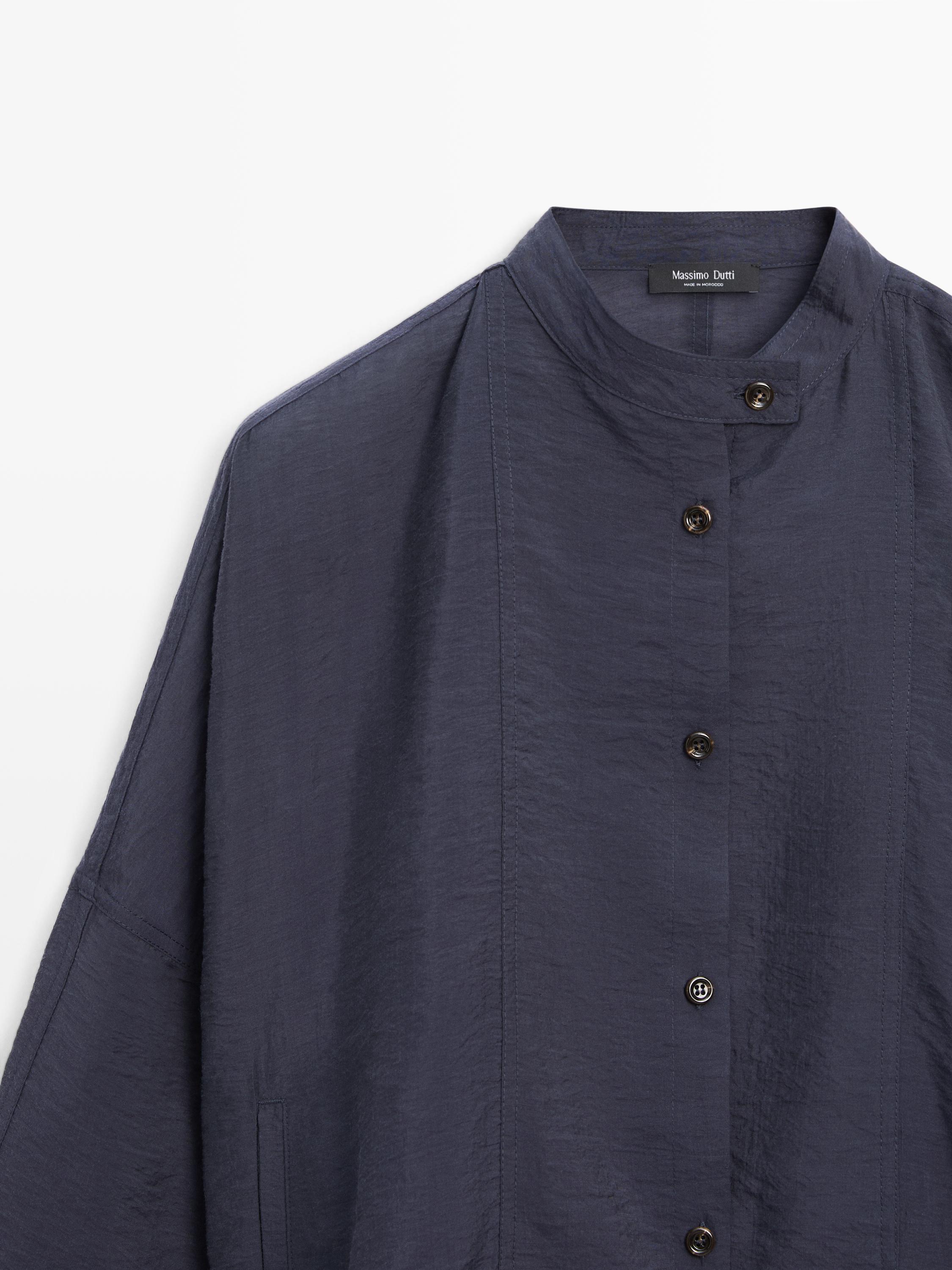 Stand collar bomber jacket with button details