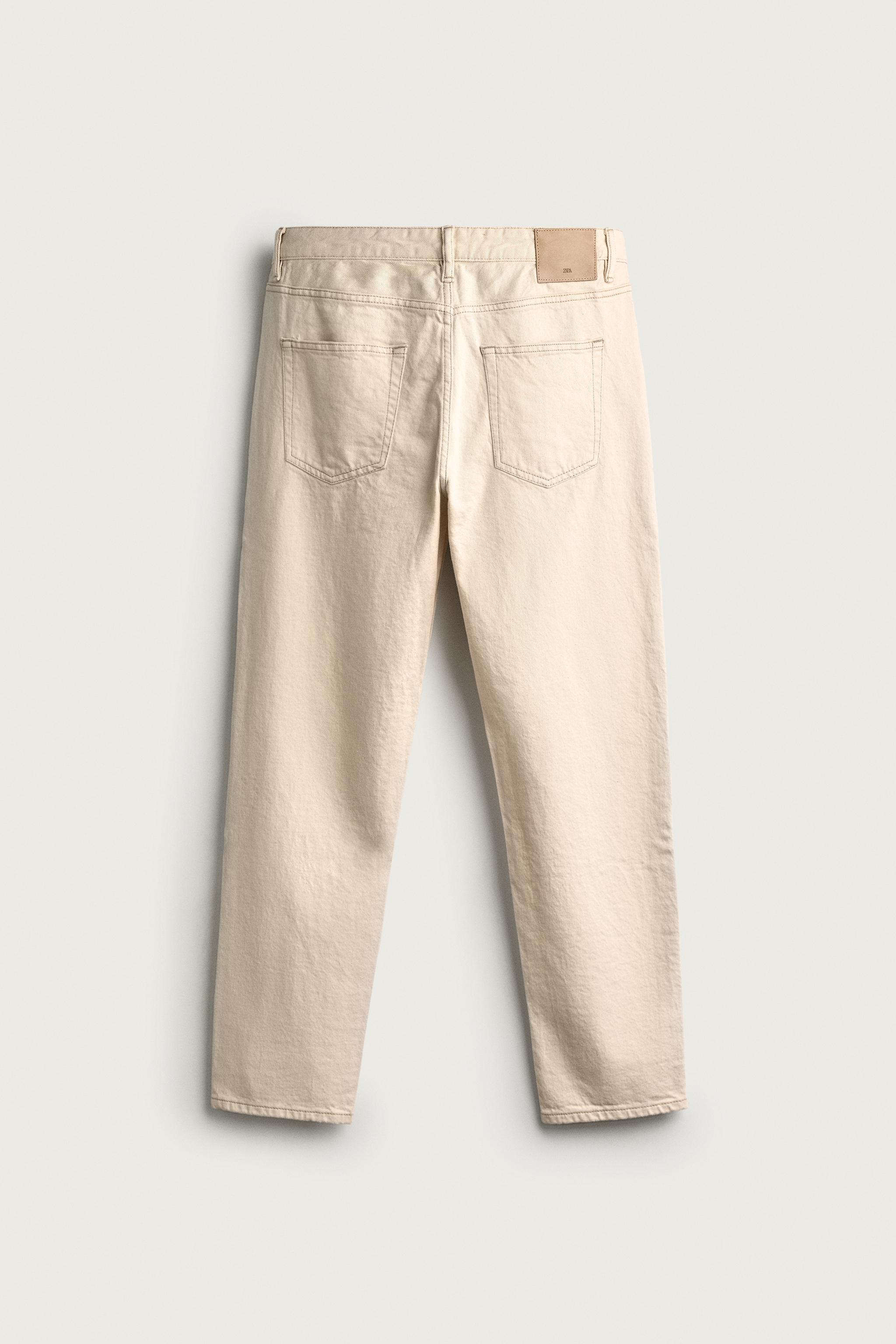 SLIM TAPERED FIT JEANS
