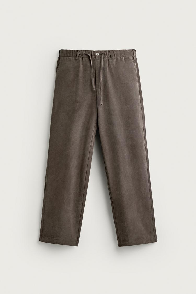 RELAXED FIT FLOWING TROUSERS