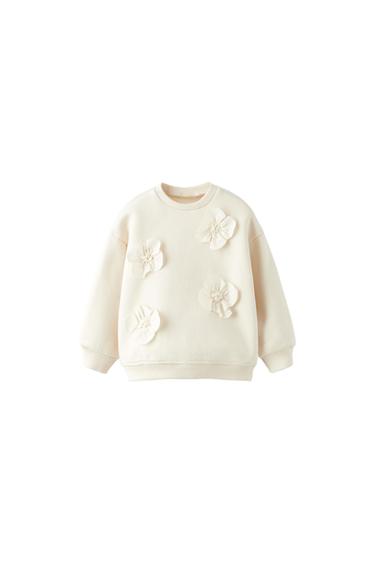 SWEATSHIRT WITH FLORAL APPLIQUÉS