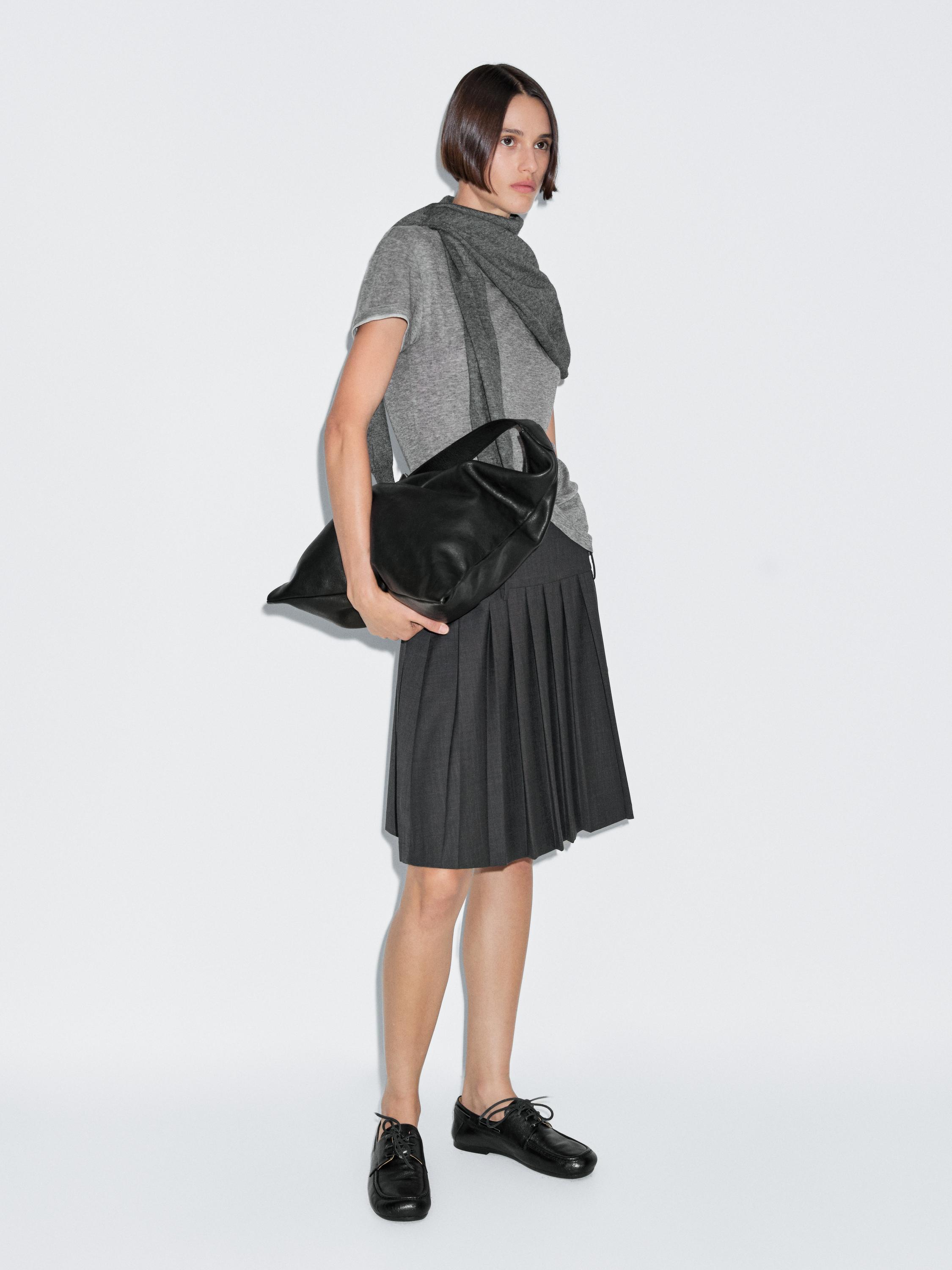 Short box pleat sash skirt