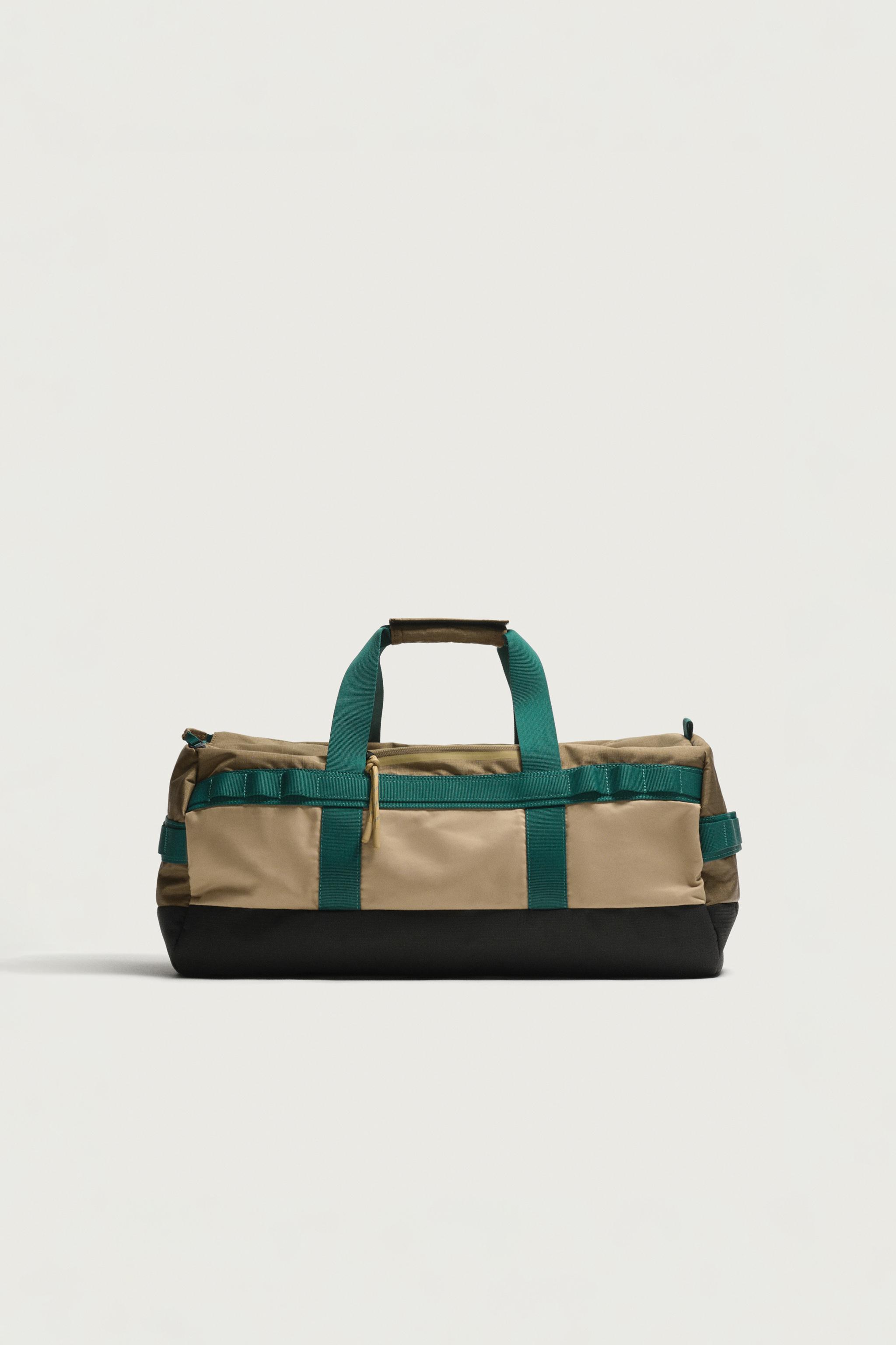TRAVEL BAG — Multi-color