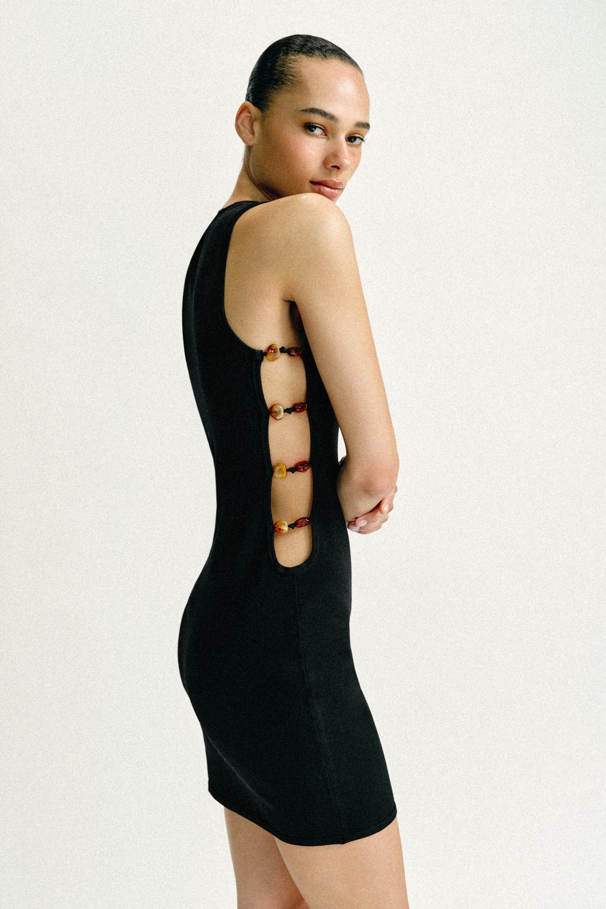 BEADED KNIT CUT-OUT MINI DRESS