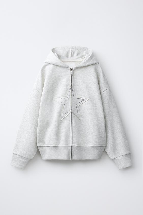 SUDADERA CAPUCHA ESTRELLA - Gris vigoré de Zara - Imagen 0