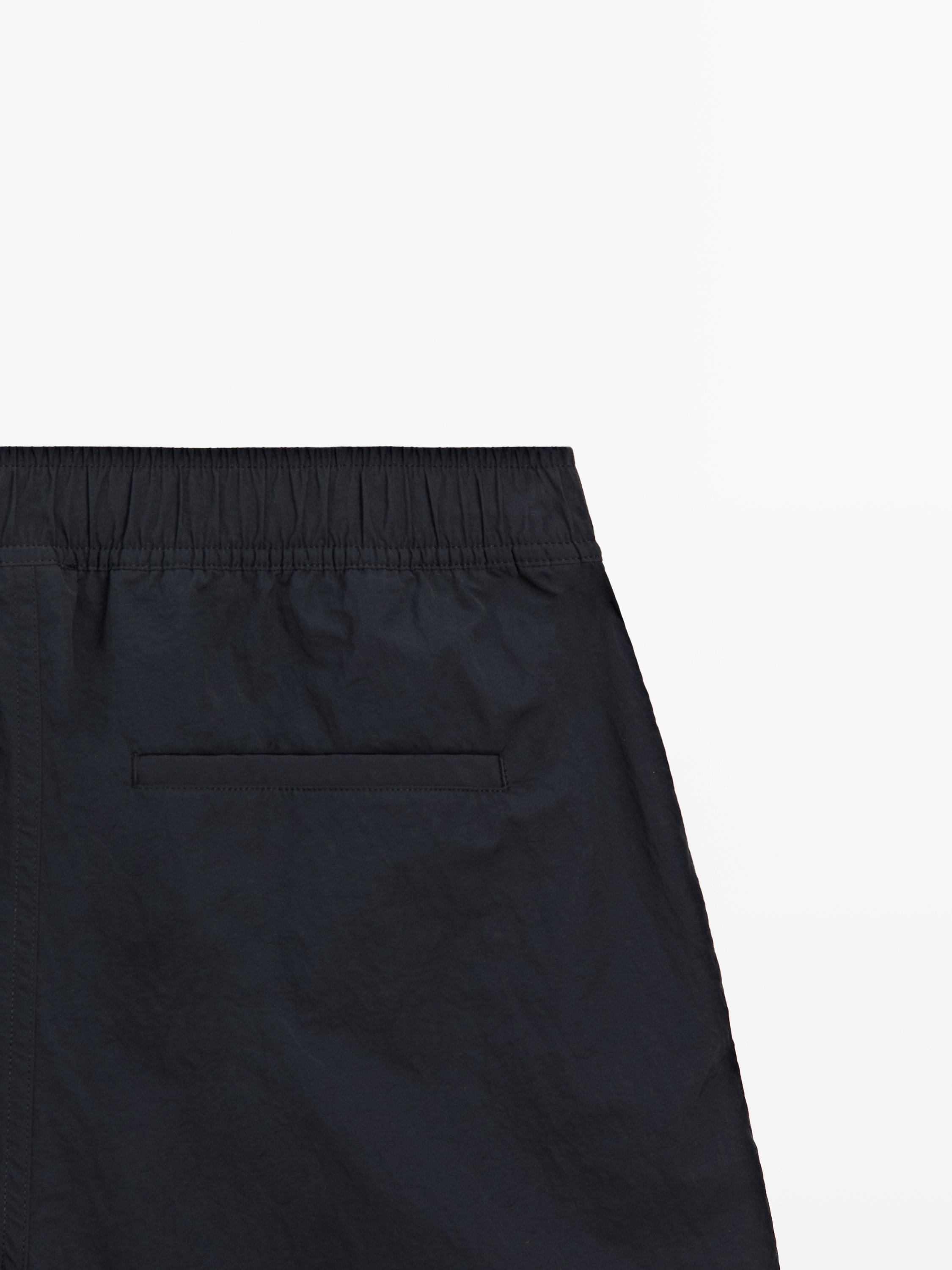 Maillot de bain uni détail taille
