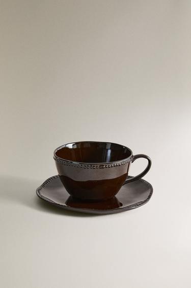 STONEWARE COFFEE CUP AND SAUCER WITH RAISED DESIGN - Brown by Zara