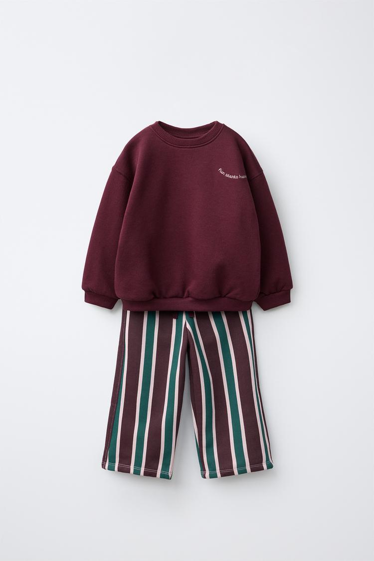 Conjunto jogging sudadera y pantalon wide leg estampado