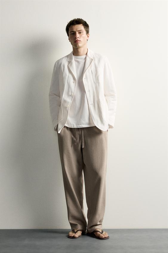PANTALÓN RELAXED FIT ESTRUCTURA - Visón de Zara - Imagen 0