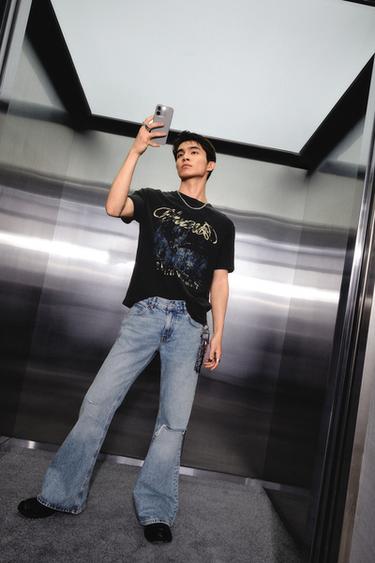 Zara 剪洞喇叭牛仔褲 - 淡藍色